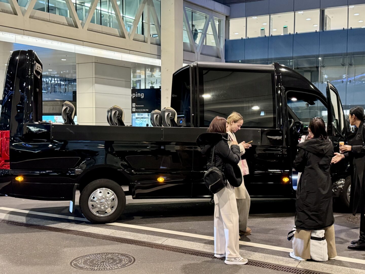 Globetransporte Sprinter Van at Zurich Airport Terminal 2 with guests before transfer to Bad Ragaz