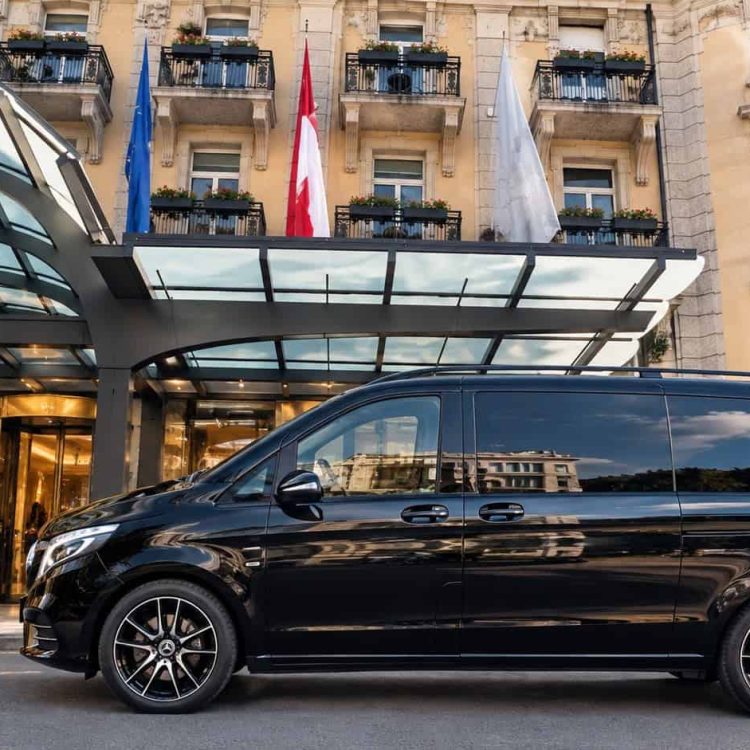 Black Mercedes-Benz V-Class 250 operated by Globetransporte outside Mandarin Oriental Palace, Luzern, after a transfer from Zurich Airport.