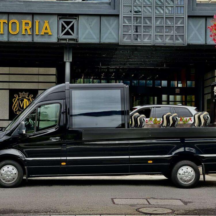 Luxury black chauffeur van for private transportation, airport transfers, and corporate events in Switzerland.