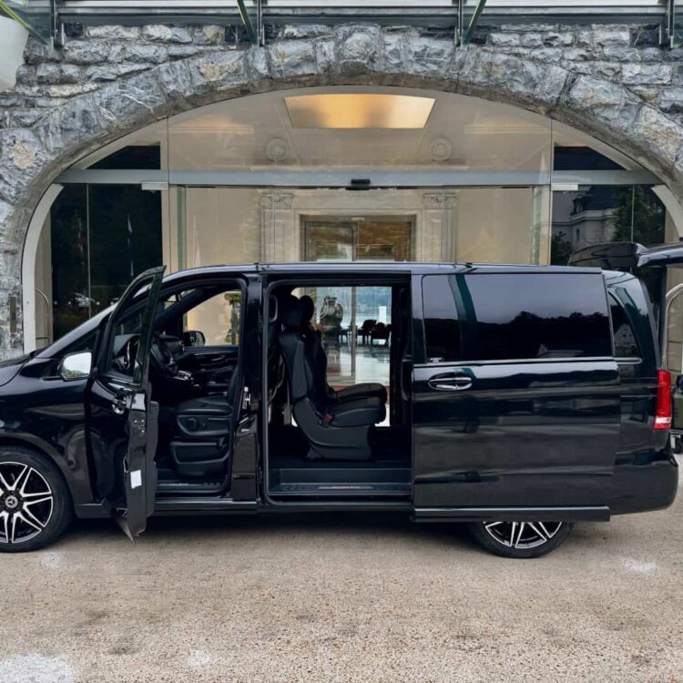 Premium black van with spacious interior for comfortable travel.