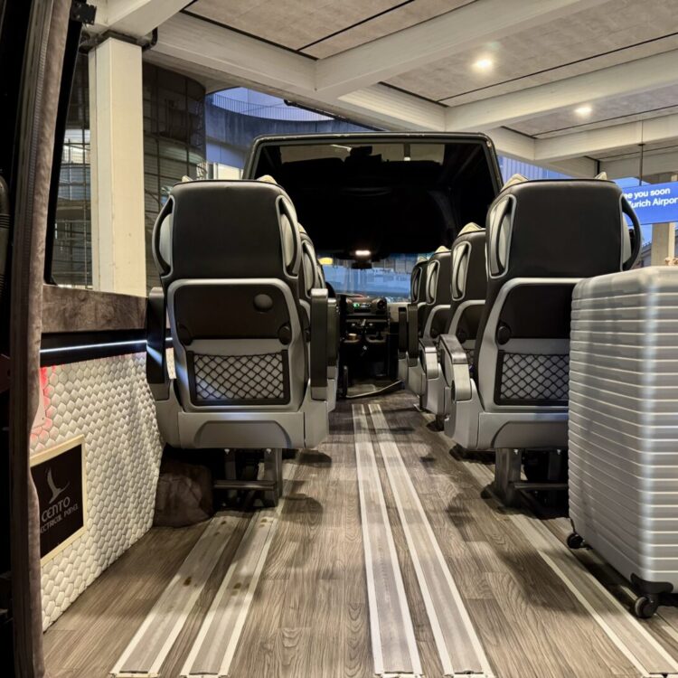 Mercedes Sprinter interior view during luggage loading at Victoria Jungfrau Interlaken for 8 passengers heading to Zurich Airport
