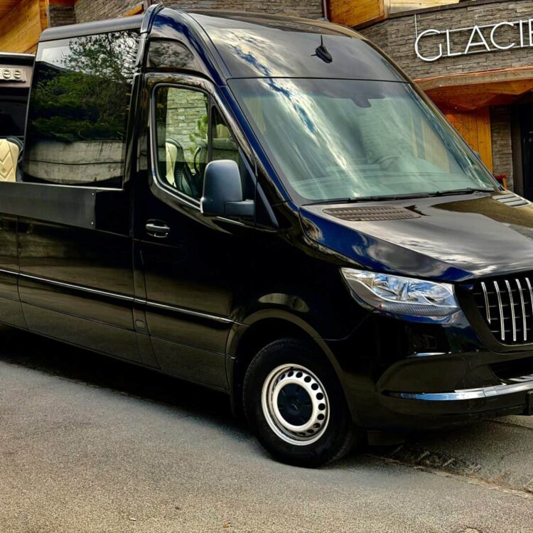 Cabrio Panorama Sprinter parked in front of Boutique Hotel & Restaurant Glacier for a private luxury tours